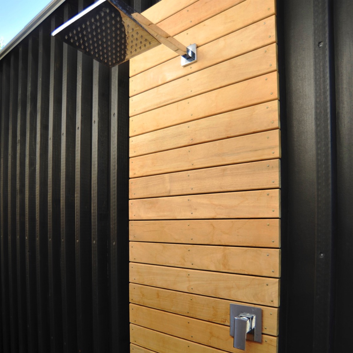 outdoor shower, black wall, timber shower,